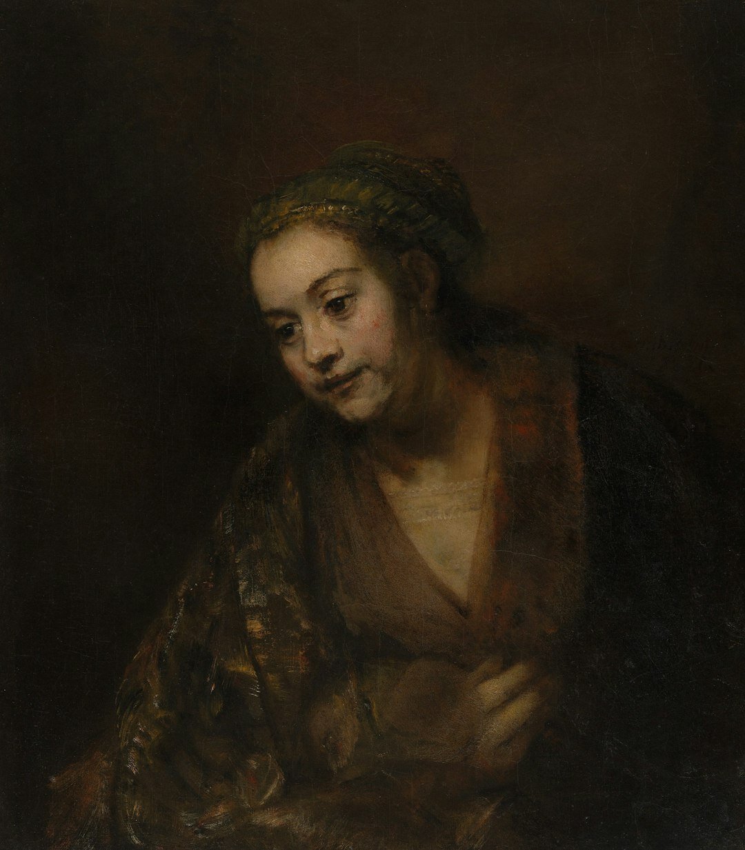 Studio portrait of a Dutch woman with curly dark hair