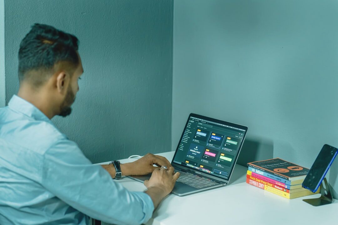 professional using ai on laptop