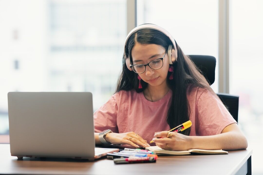 person learning online at home